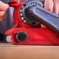 EINHELL PROFESSIONAL akumulatorska tračna brusilica TP-BS 18/457 Li BL + 2,5 Ah Starter Kit - 7